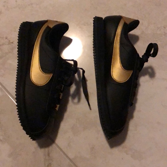 nike cortez black gold